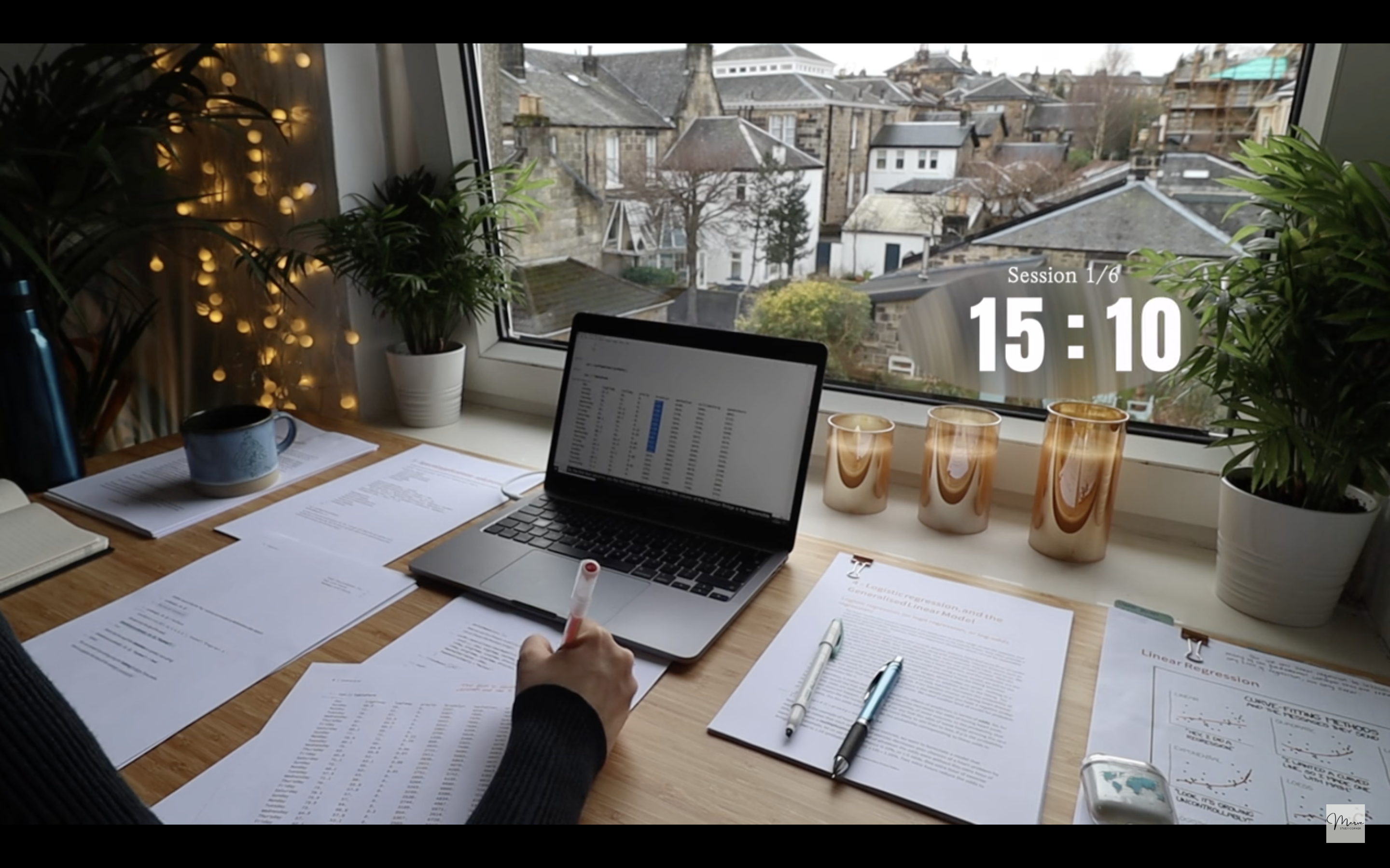 Screenshot of a "study with me" video uploaded by Merve. A person (face not visible) is sitting at a desk and looking at a laptop with papers strewn about. A timer on the screen reads "Session 1/6 15:10". 
