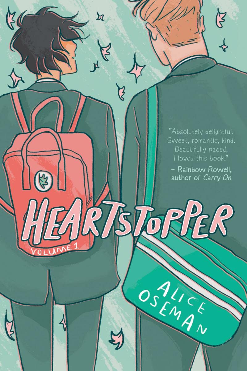 The book cover of "Heartstopper" in graphic novel form, with Charlie Spring and Nick Nelson's backs facing the reader and Charlie's face turned to face Nick. 