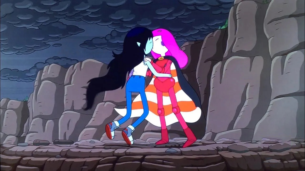 A shot of two characters from "Adventure Time," Marceline and Princess Bubblegum, kissing. 