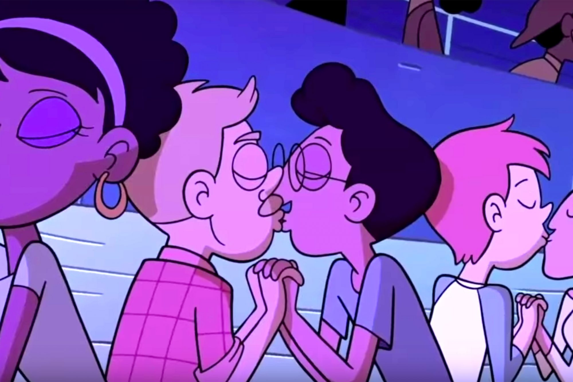 A gay male couple kissing in the background of one of the scenes of "Star vs. the Forces of Evil." 