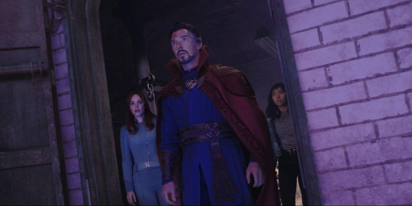 Rachel McAdams as 838 Christine Palmer, Benedict Strange as Dr. Stephen Strange, and Xochitl Gomez as America Chavez standing at the waypoint for the Book of Vishanti in Doctor Strange in the Multiverse of Madness (2022).