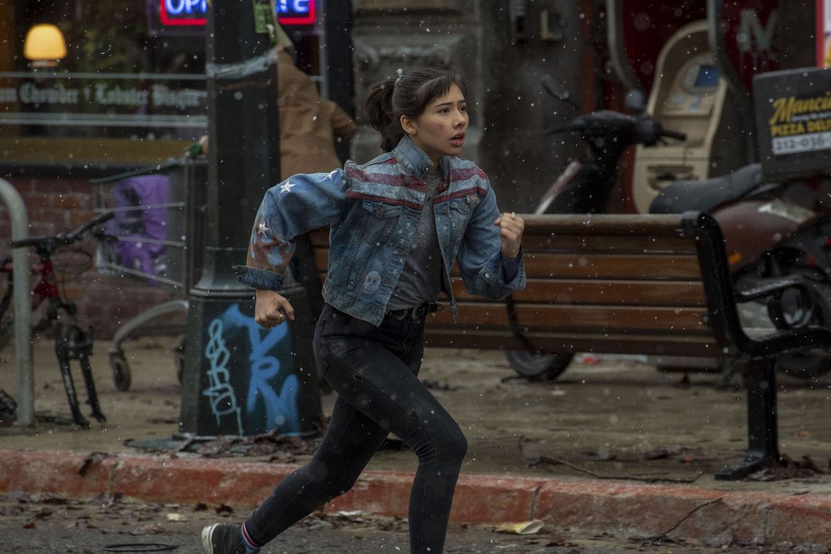 Xochitl Gomez as America Chavez running from Gargantos in Doctor Strange in the Multiverse of Madness (2022).