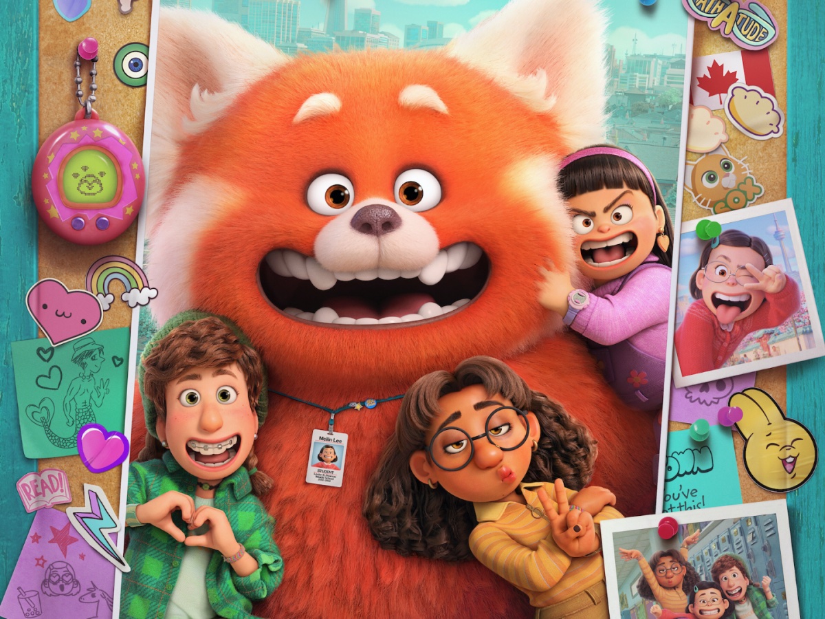 The main friend group in "Turning Red" posing in the mirror, with Mei in her red panda form surrounded by Abby, Miriam, and Priya. 