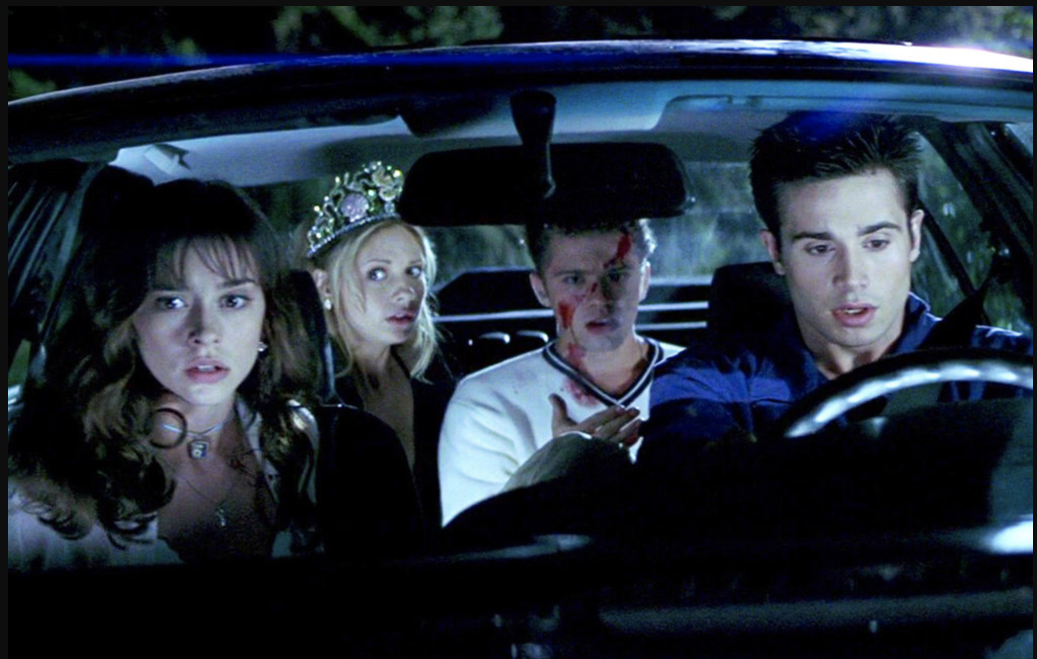 The four teens in 'I Know What You Did Last Summer' drive home from the 4th of July festivities. 