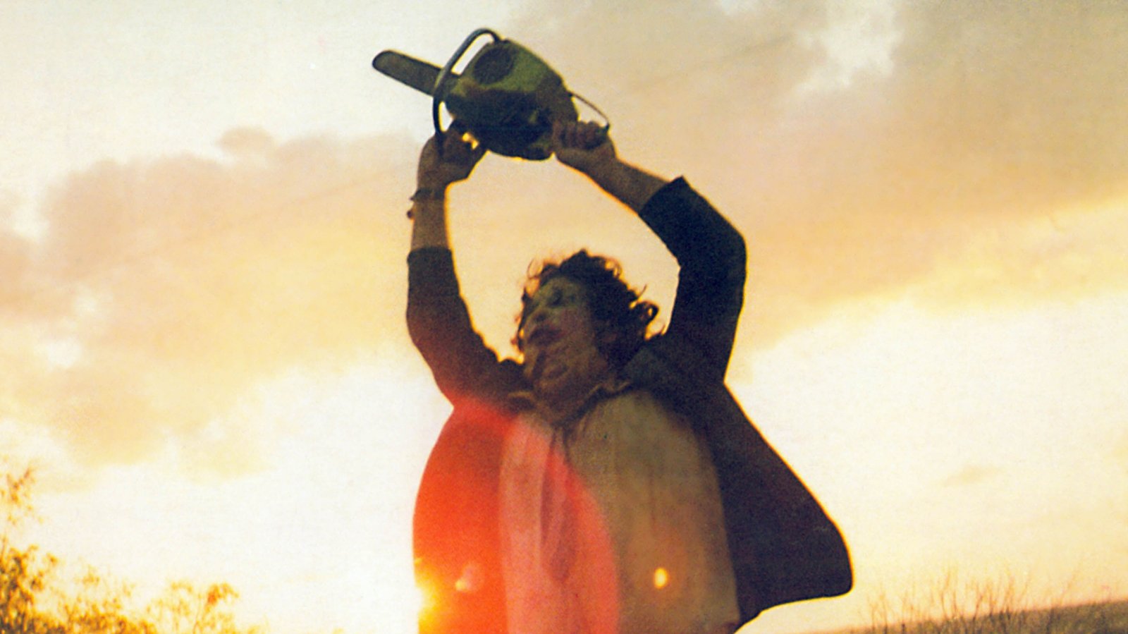 Leatherface swings his chainsaw around as the sun comes up in 'The Texas Chainsaw Massacre.' 