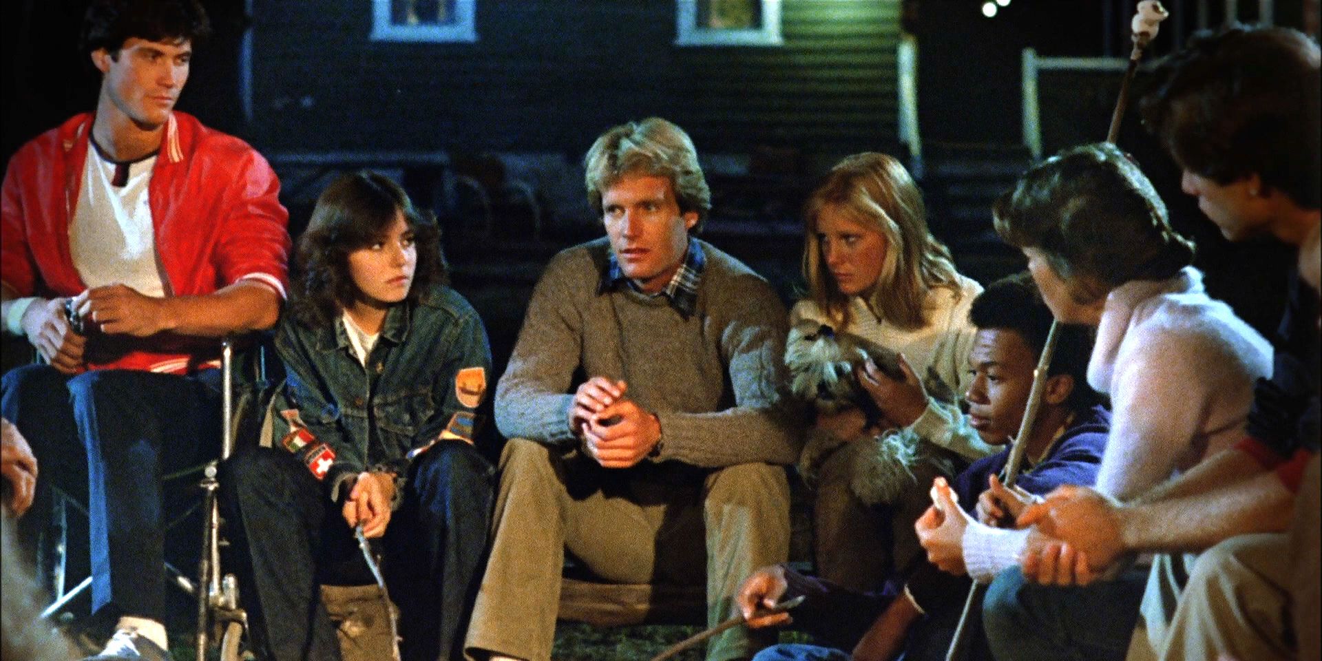 The counselors gather around the fire to hear the story of Jason in 'Friday the 13th: Part II.'