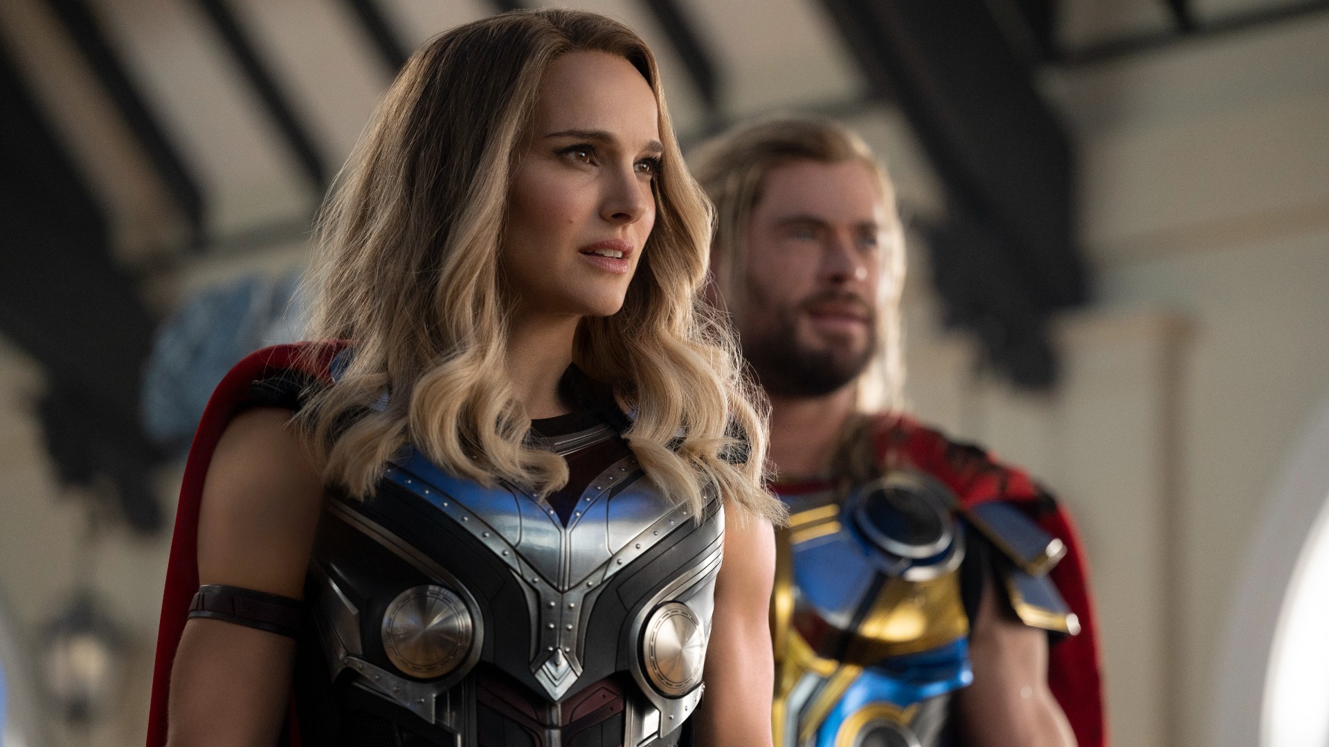 Natalie Portman as the Mighty Thor in the throne room of Omnipotent City in Thor: Love and Thunder (2022). 