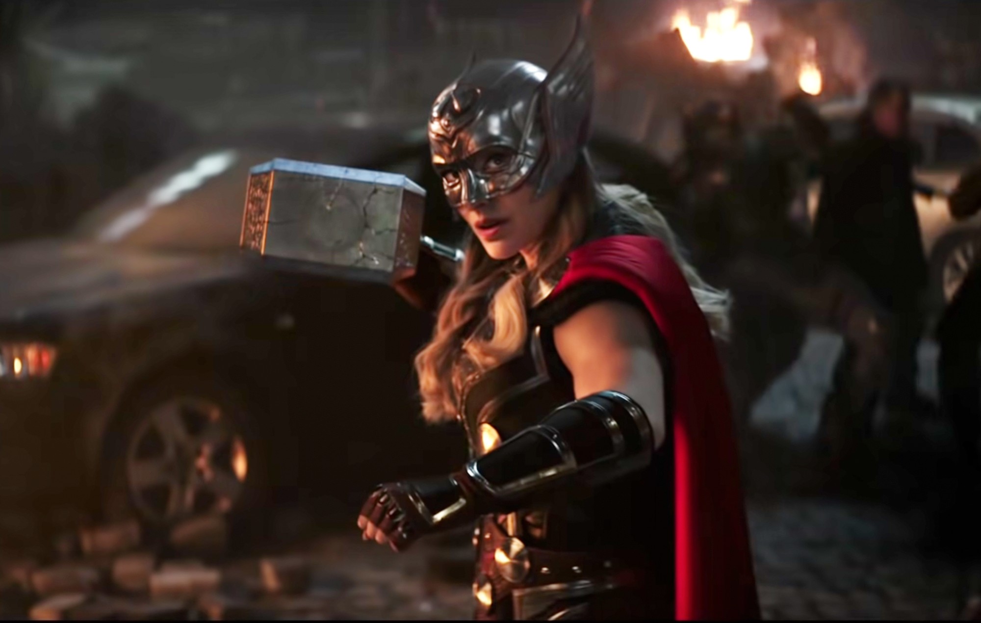 Natalie Portman as the Mighty Thor in battle in Thor: Love and Thunder (2022).