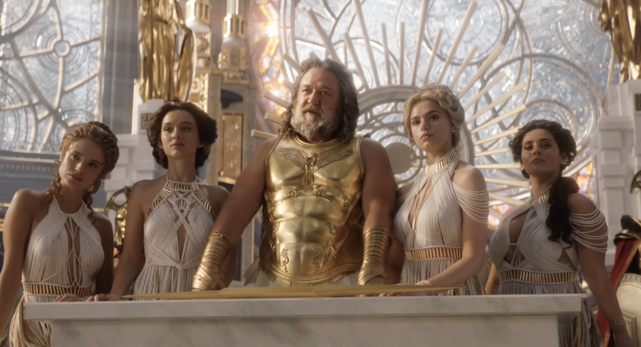 Russell Crowe as Zeus with his harem in Omnipitent City in Thor: Love and Thunder (2022).