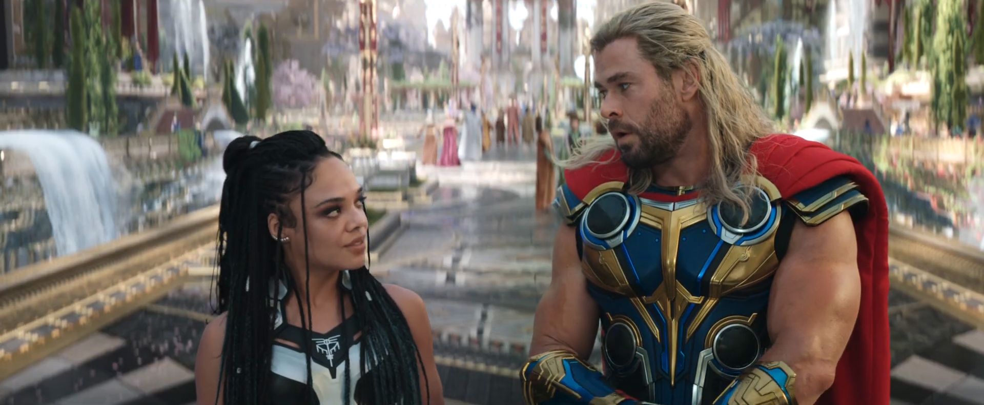 Tessa Thompson as King Valkyrie and Chris Hemsworth as Thor in Omnipotent City in Thor: Love and Thunder (2022).