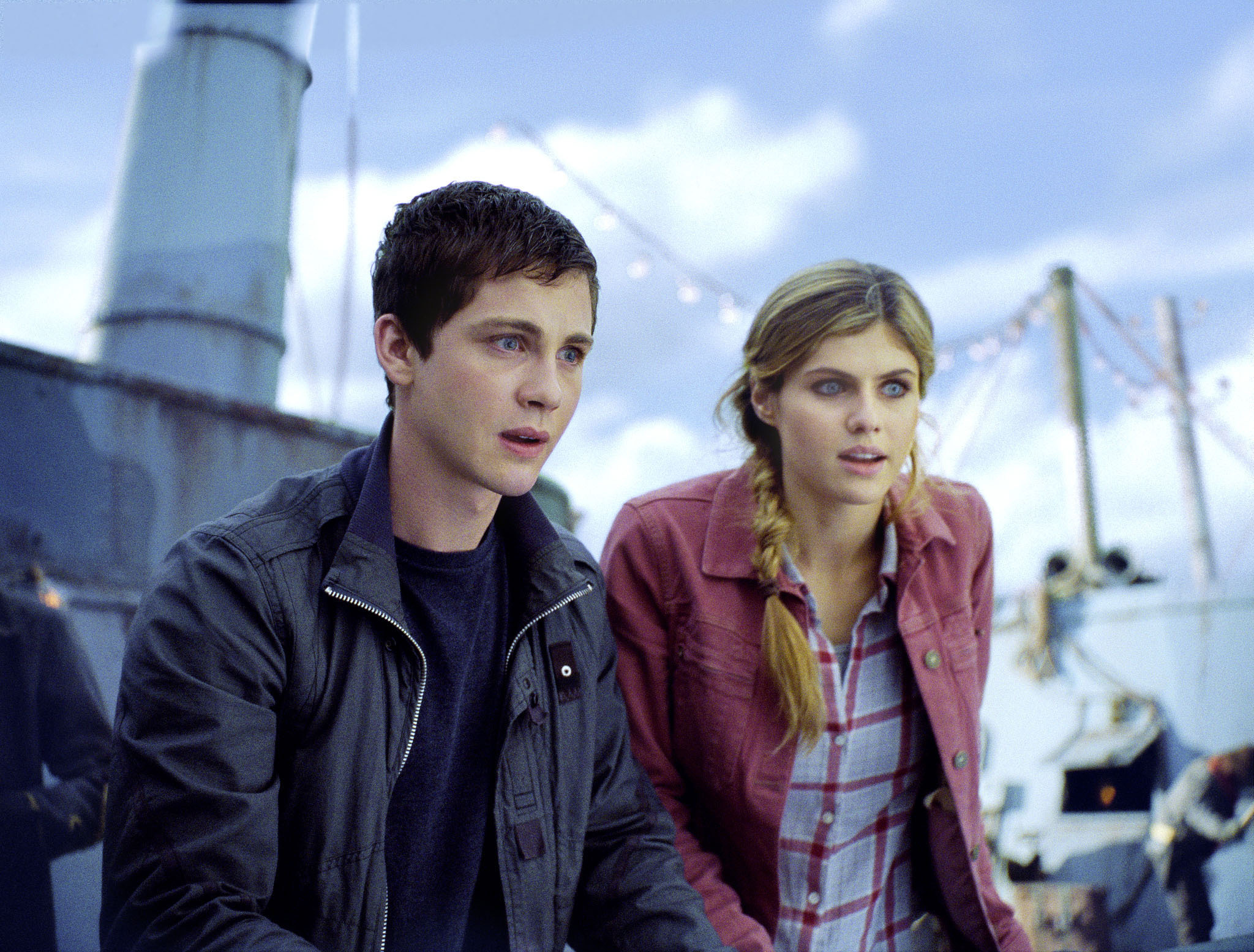 Pacy and Annabeth stand on the deck of a large metal ship, looking over the side at something shocking and concerning.