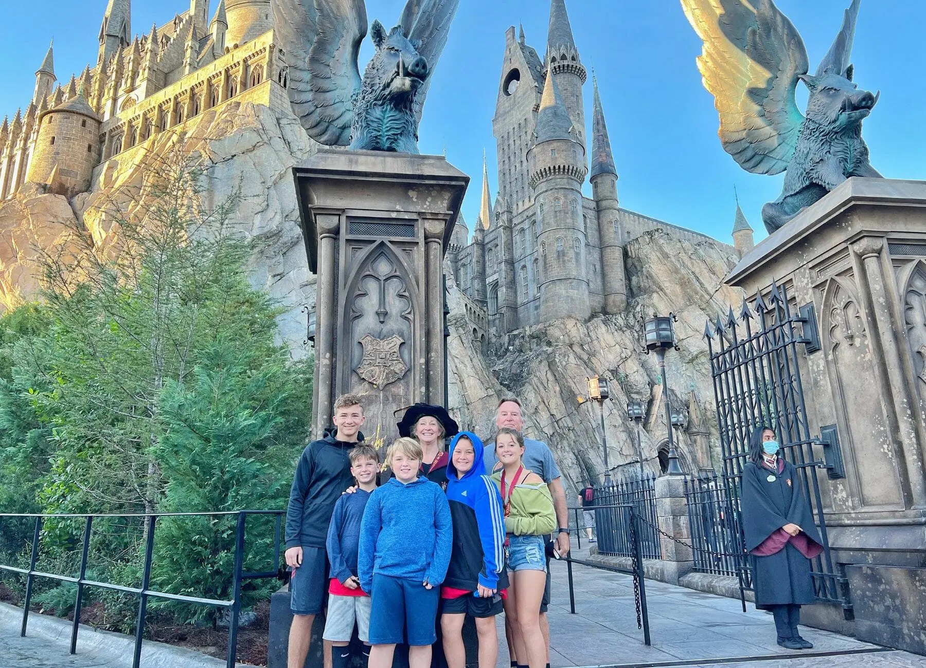 A picture of a family at Harry Potter World: Universal Studios. GreenBean. A family at Harry Potter World: Universal Studios. 2022.