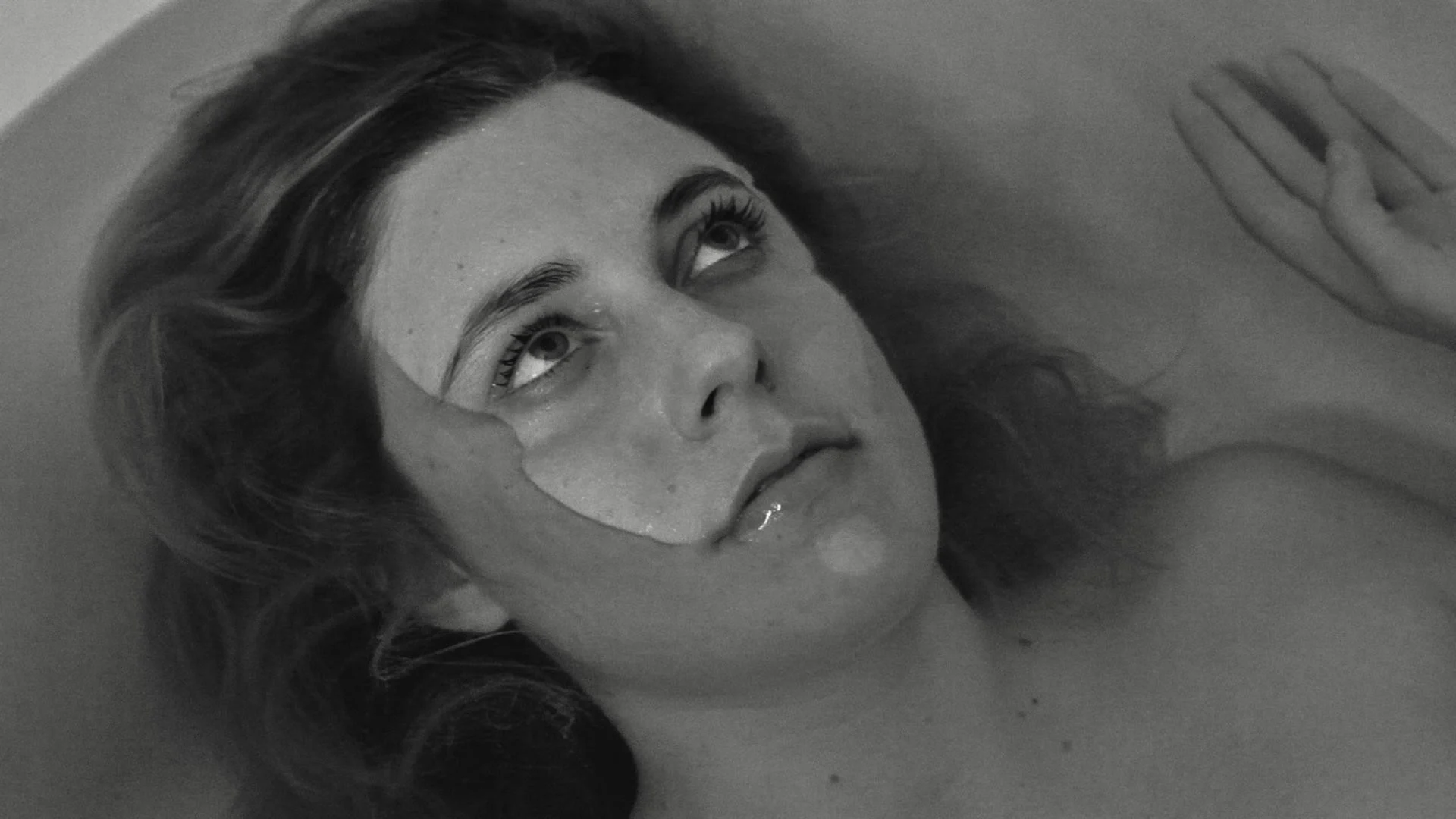 Greta Gerwig as Frances taking a bath at her parents house. Baumbach, Noah, Dir. Frances Ha. 2012.