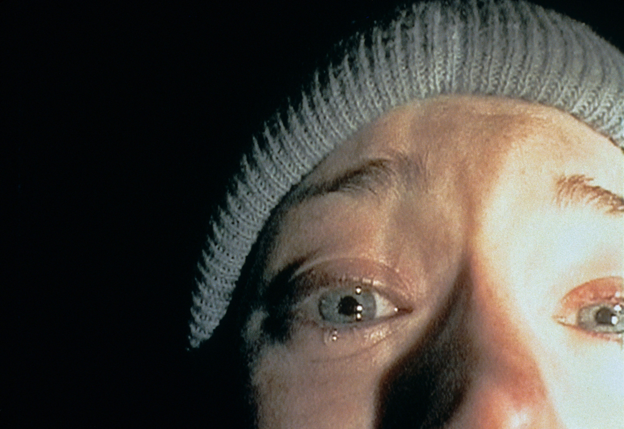 Dir. Myrick, Daniel & Sanchez, Eduardo. The Blair Witch Project (1999). Close-up found footage of a girl crying.