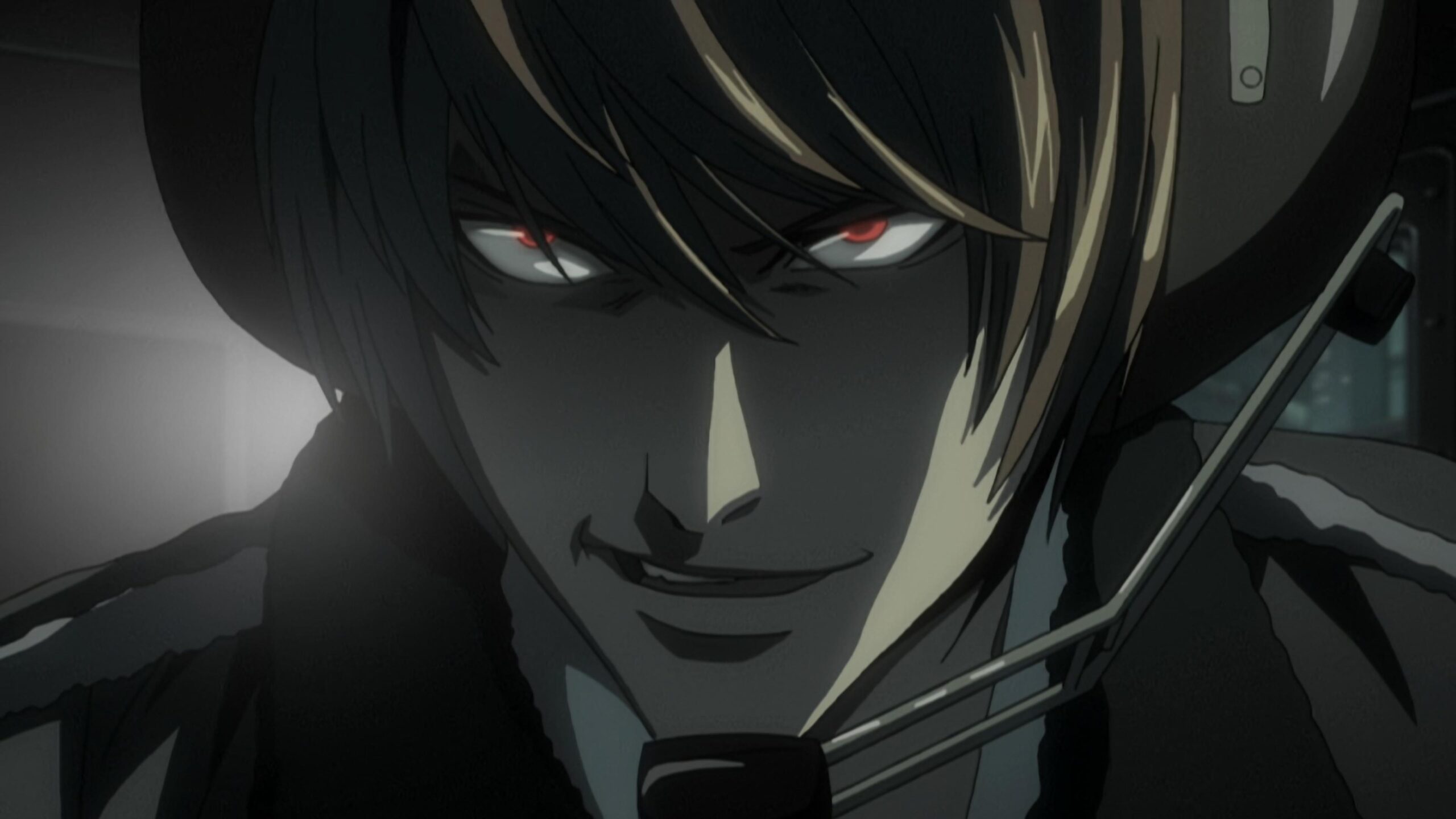 Man speaks through headset. Episode 24: "Revival." Death Note. Madhouse. 2006-2007. 