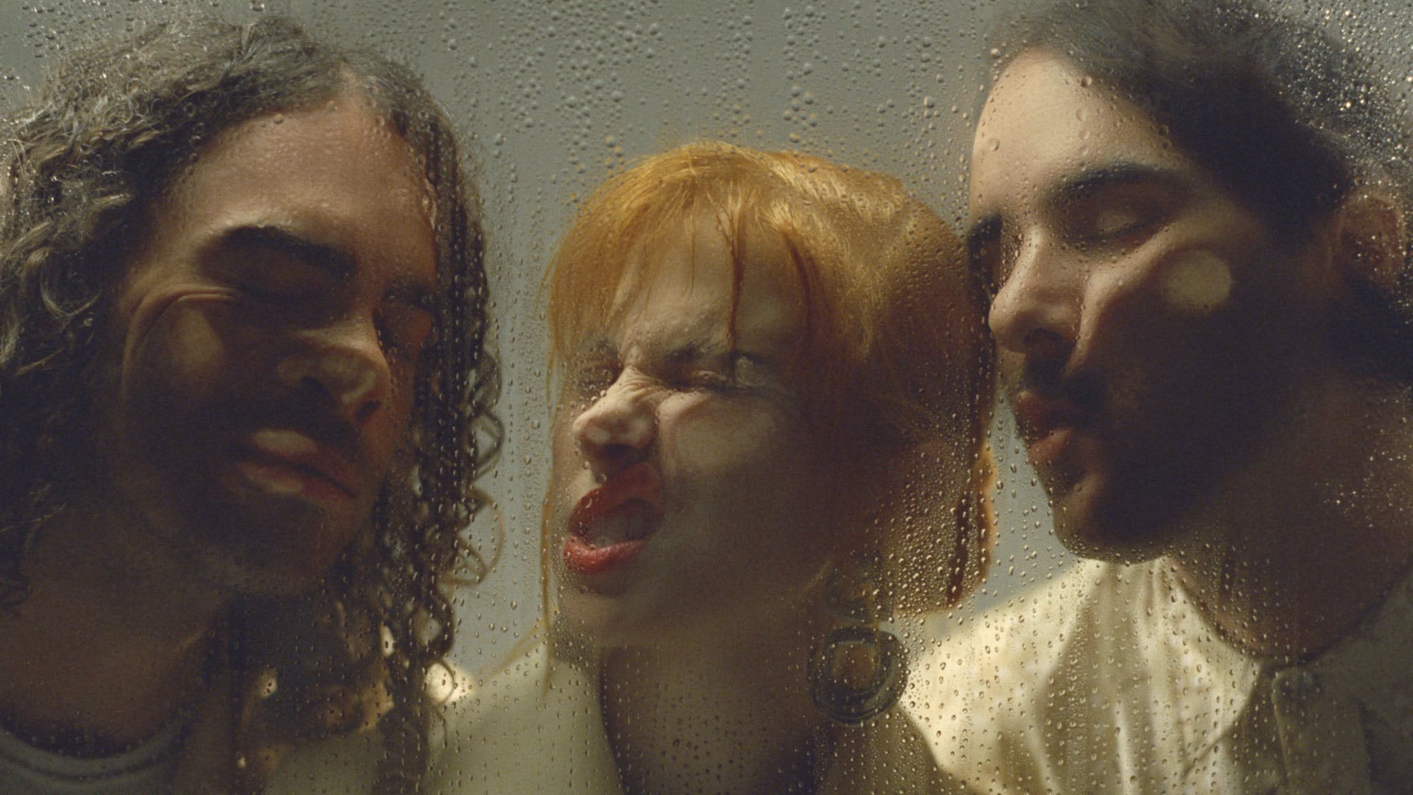 Taylor York (left) Hayley Williams (center) and Zac Farro (right) on the cover art for "This Is Why." "This Is why" Paramore. fueled by ramen. 2023.