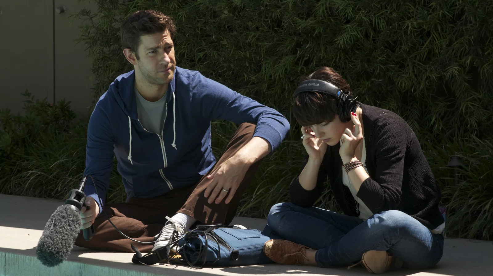 John Krasinski and Olivia Thirlby recording sound in “Nobody Walks” (2012).