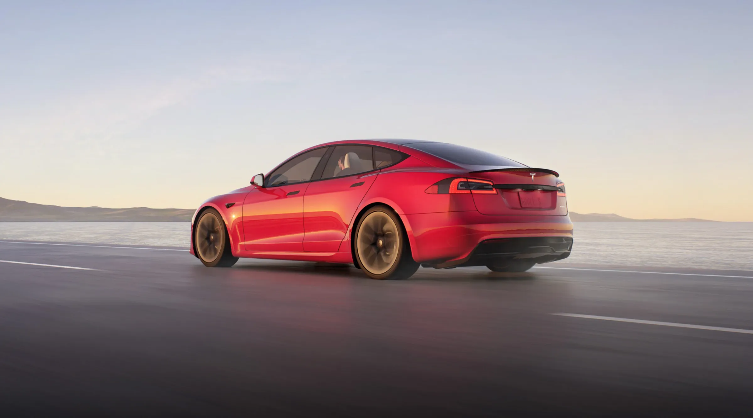 Side view of red Tesla Model S. (Tesla Model S Gets Updated, Is The “Fastest Accelerating Production Car Ever Made. Mike Shouts. 2021, Jan 30.)