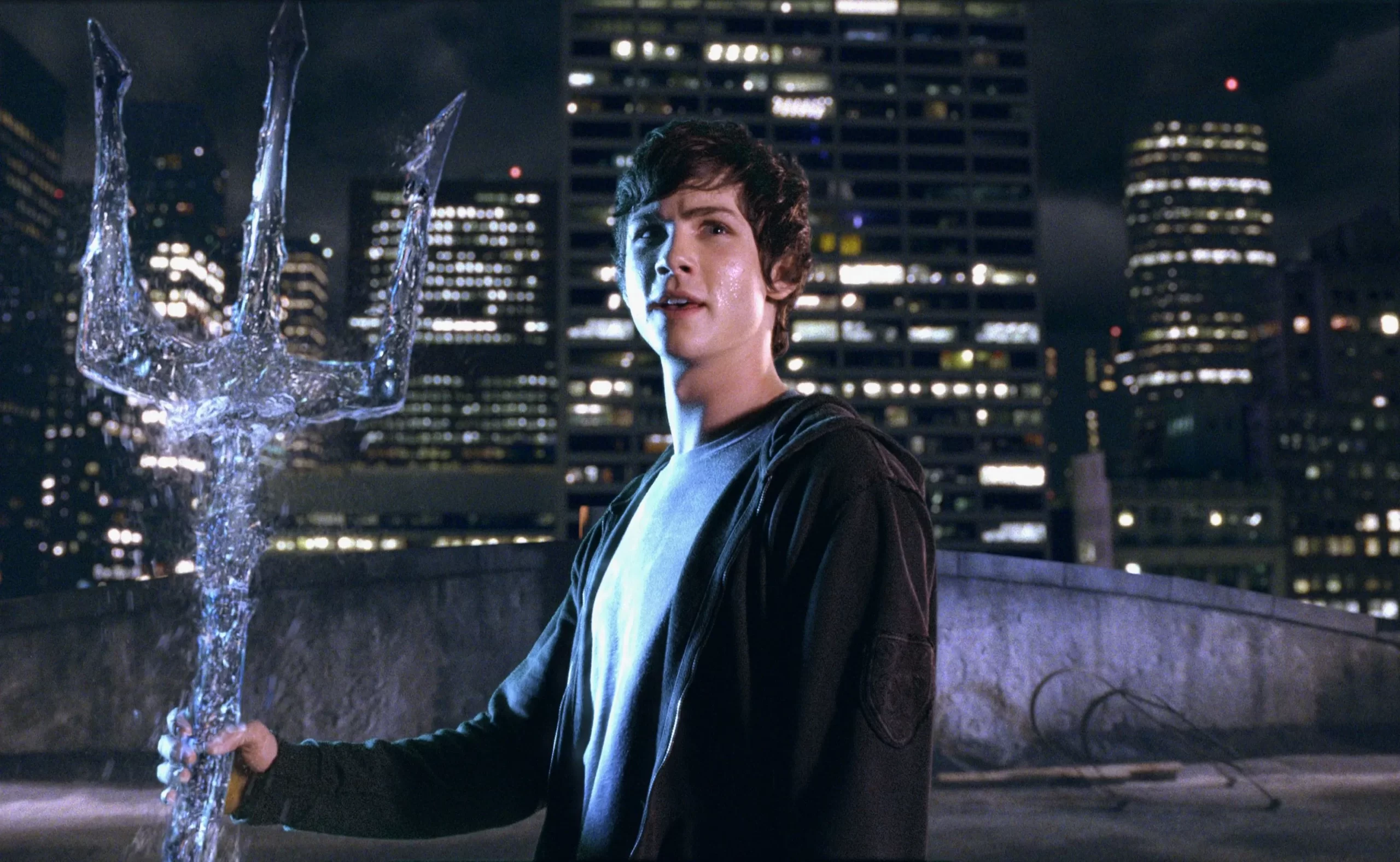 Percy Jackson holding a trident. Columbus, Chris, Percy Jackson And The Olympians: The Lightning Thief. 2010. Based on the book of the same name.