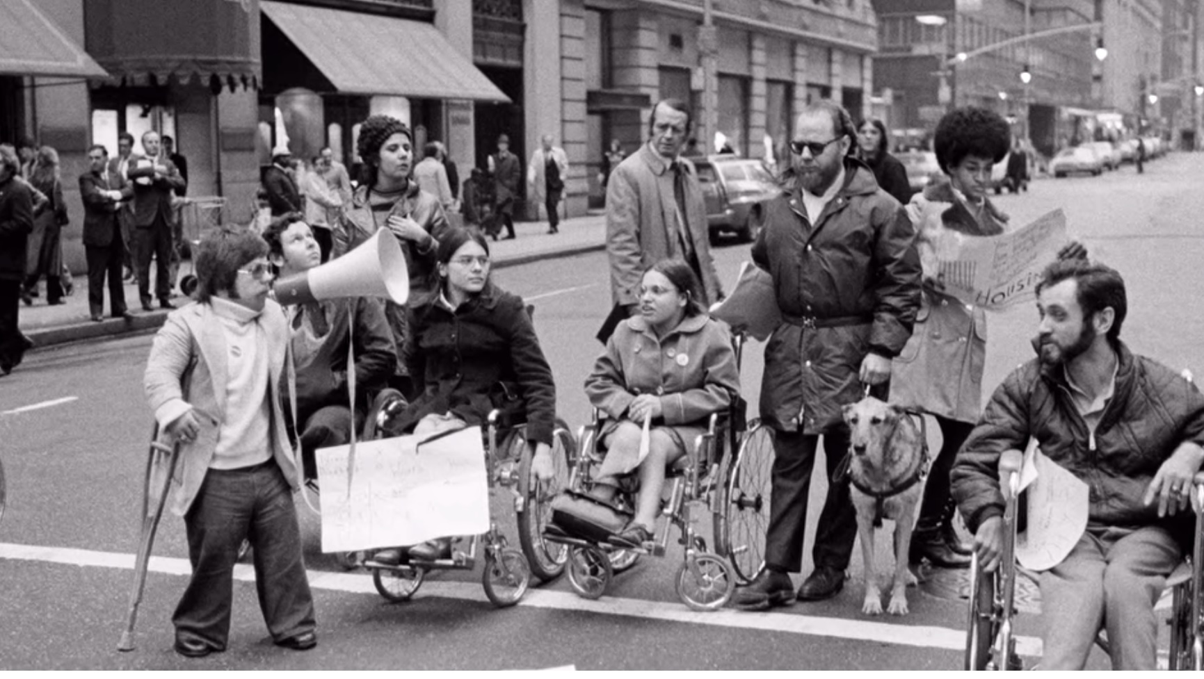 Newnham, Nicole and Lebrecht, James, dir. Crip Camp. 2020.
Judith Heumann and other disabled activists protesting in the street. 