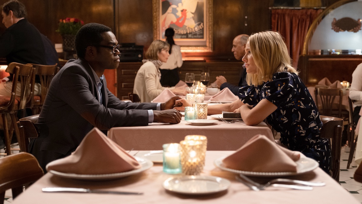 Eleanor and Chidi having dinner together in the finale. 