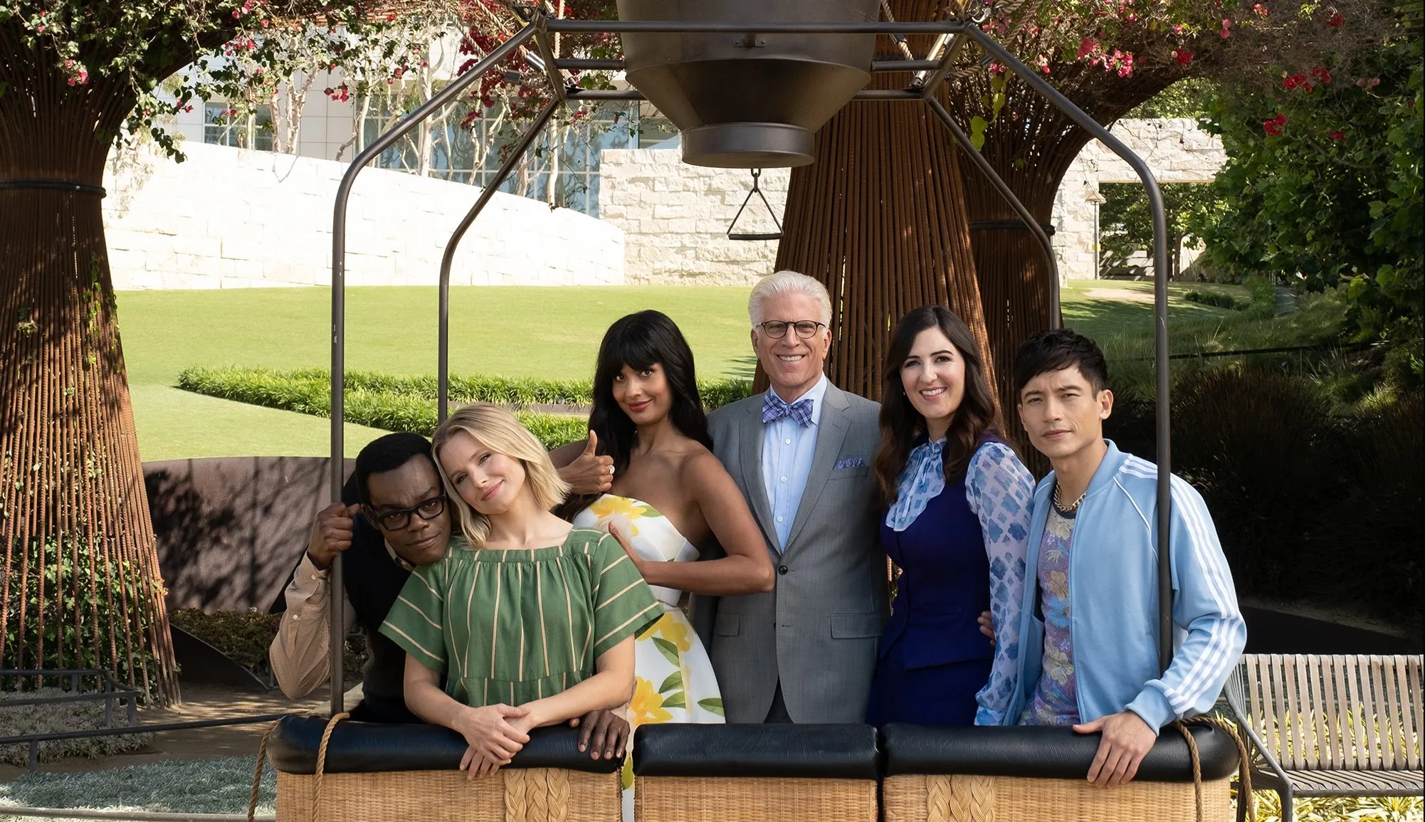 Chidi, Eleanor, Tahani, Michael, Janet, and Jason in a hot air balloon on their way to the Good Place.