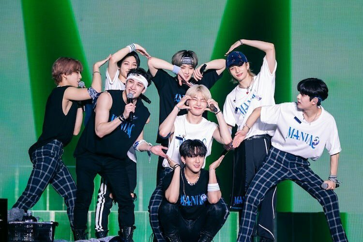 STRAYKIDS members Bang Chan, Felix, Han, I.N. Lee Know, Hyunjin, Seungmin, and Changbin pose at their Tokyo concert.