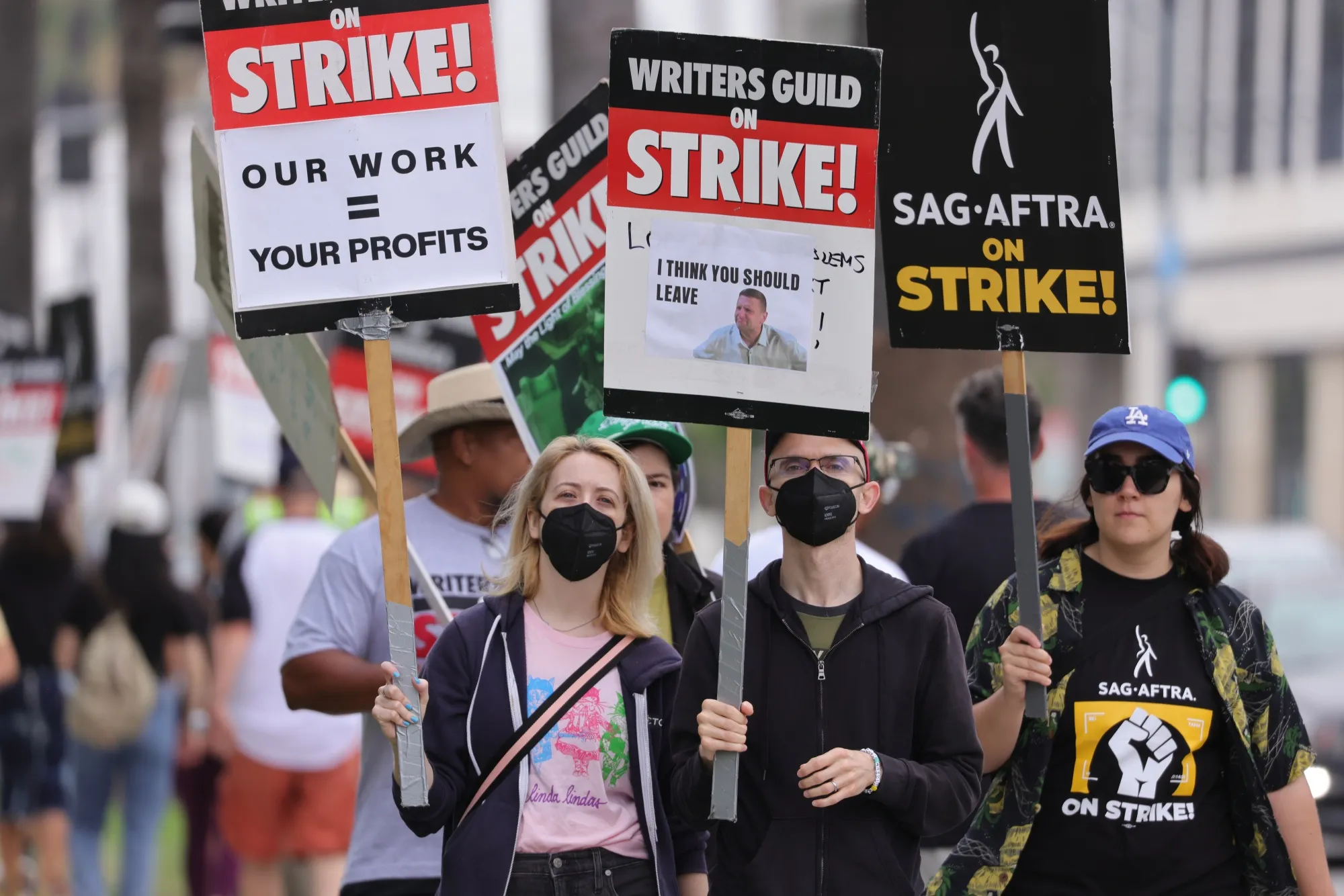 Industry employees protesting AI with SAG AFTRA and the Writer's Guild