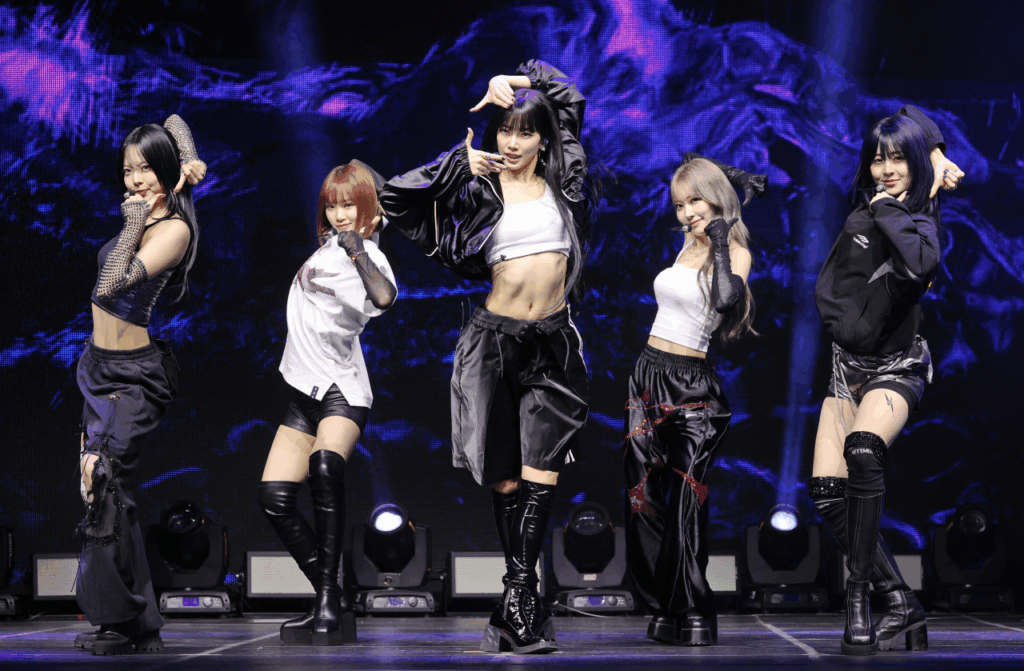 LE SSERAFIM members Eunchae, Chaewon, Kazuha, Sakura, and Yunjin perform "CRAZY" where black and white street style outfits. 