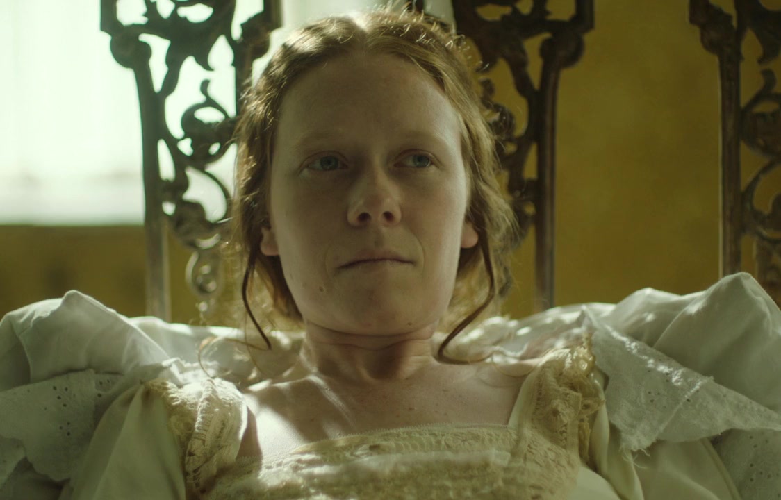 A picture of "The Yellow Wallpaper" 2021 movie. A closeup of the woman as she lays in bed and looks off screen. Her bed frame is steel and sits in the middle of the room. 

Pontuti, Kevin. The Yellow Wallpaper. Hysteria Pictures, 2021.