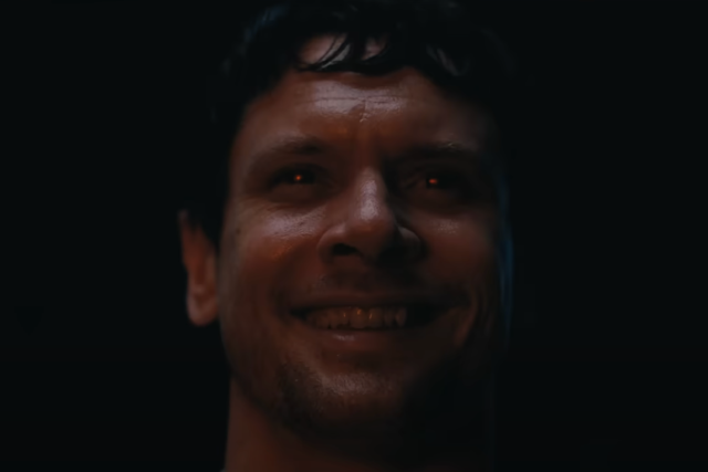 An Irish vampire stares at the camera.