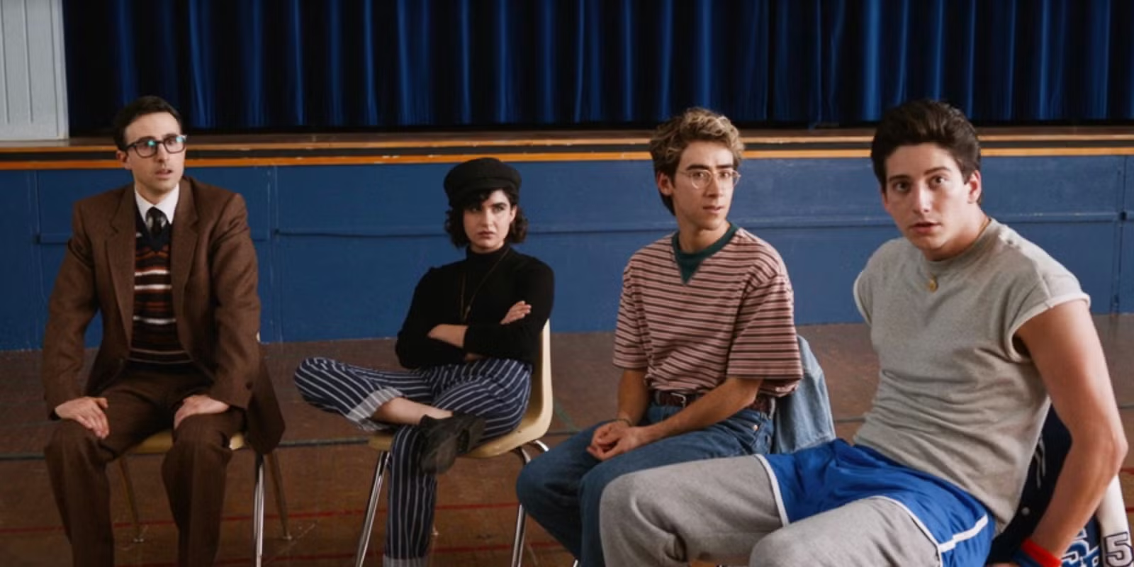 School Spirits characters Mr. Martin, Rhonda, Charley, and Wally looking confused.