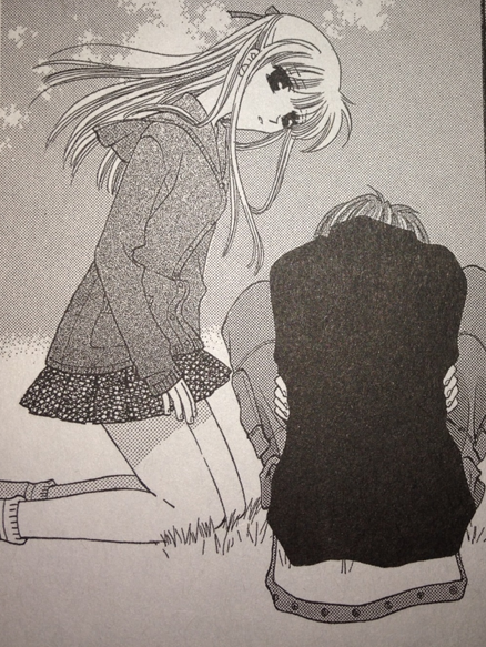 Tohru comforts Kyo. Fruits Basket. Natsuki Takaya. Yen Press, 1998-2006.