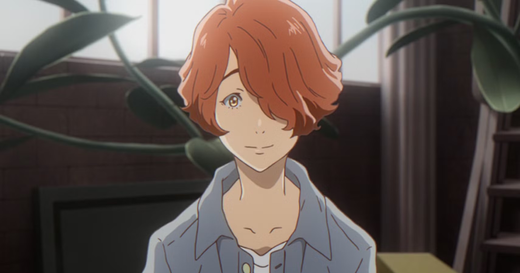 Roddy from Carole and Tuesday looks forward and smiles. 