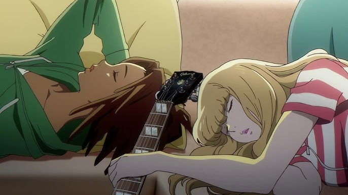 Carole and Tuesday sleep with instruments in hand.