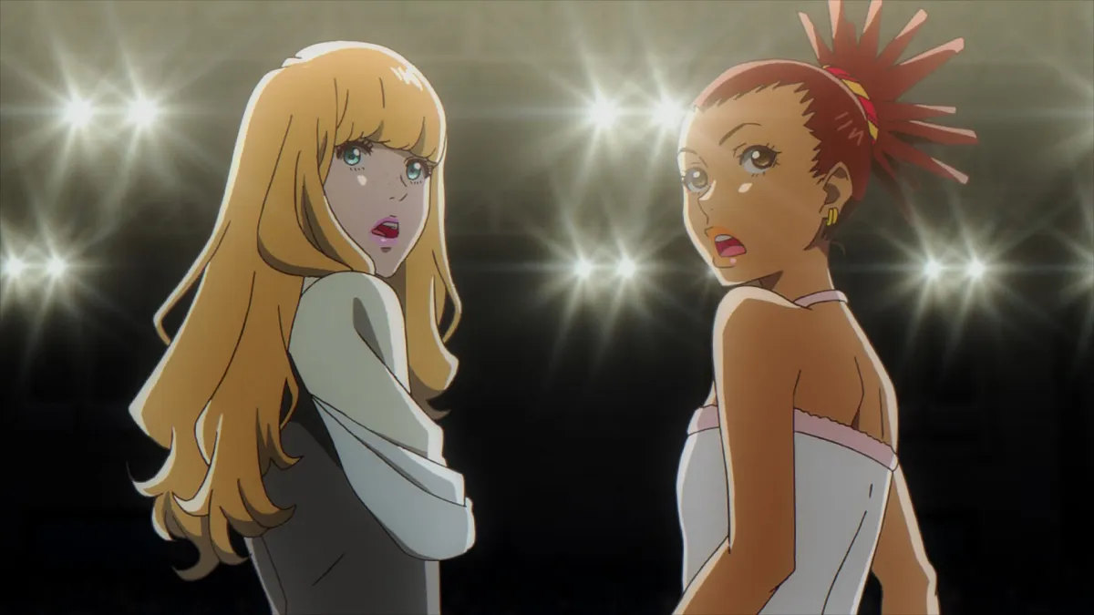 Carole and Tuesday look amazed while on stage. 