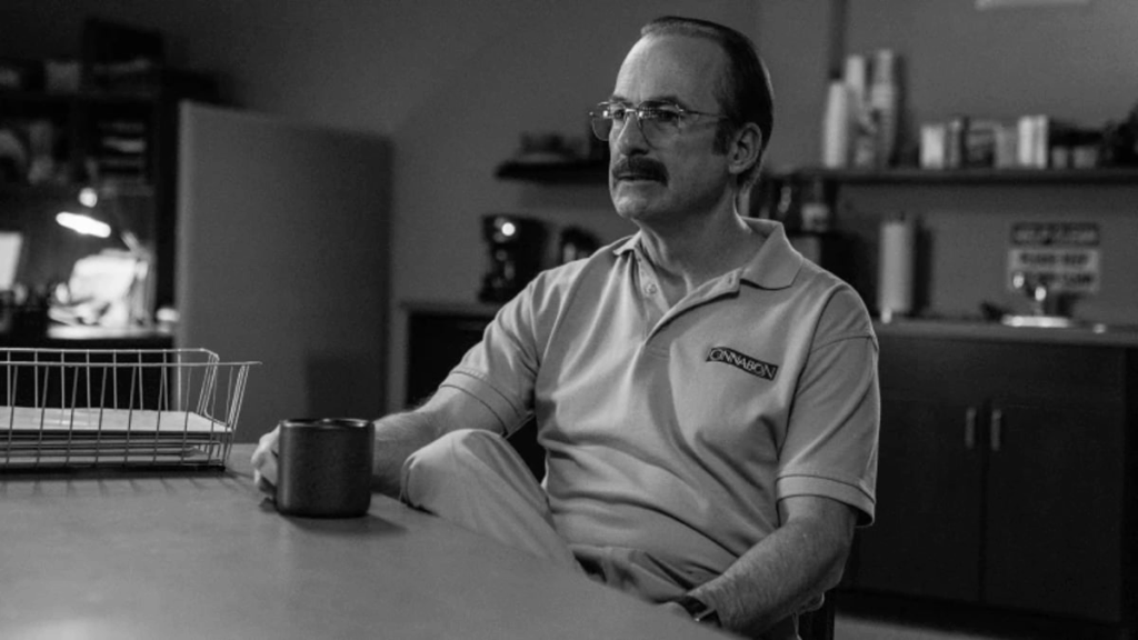 Saul Goodman as Gene Takavic holding a coffee mug. Gilligan, Vince and Gould, Peter. Better Call Saul. AMC, 2015.