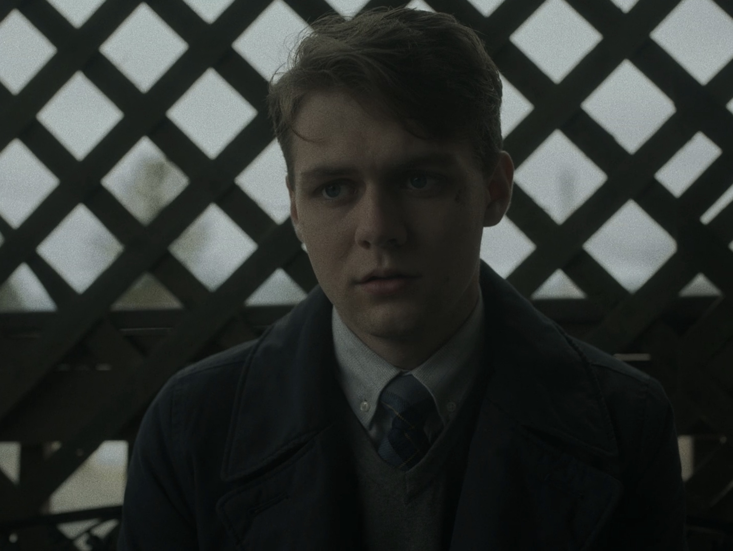 A missionary in Charlie's house in 'The Whale.' Aronofsky, Darren. The Whale. 2022.