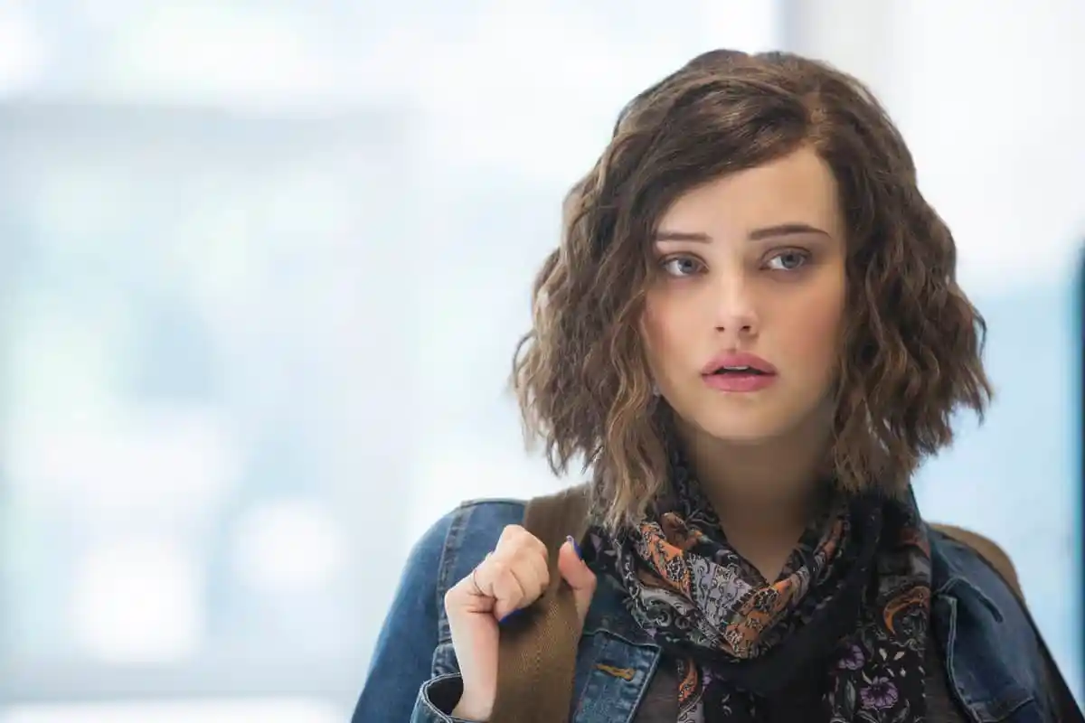 Hannah Baker from '13 Reasons Why' staring past the camera. 
Yorkey, B., Creator. '13 Reasons Why.' Netflix, 2017-2020.