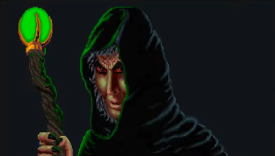 A man in a dark hooded robe clenches an ominous staff with a glowing, green ball of energy at the tip.