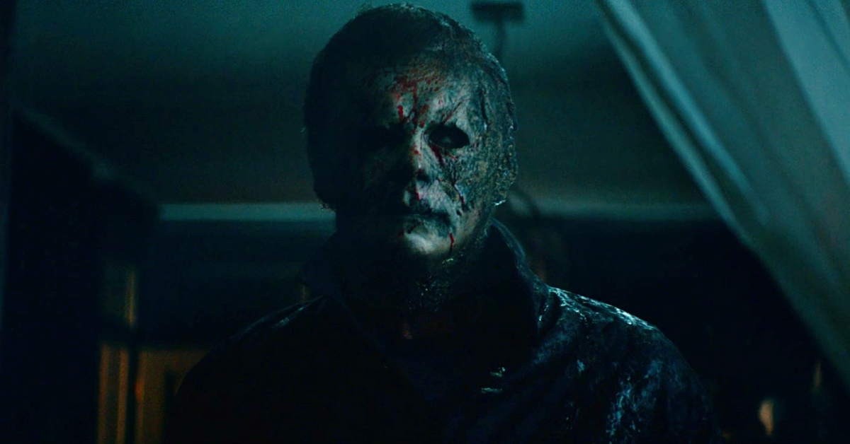 James Jude Courtney as Michael Myers. Blood is on his mask. Green, David Gordon, dir. Halloween Kills. 2021.
