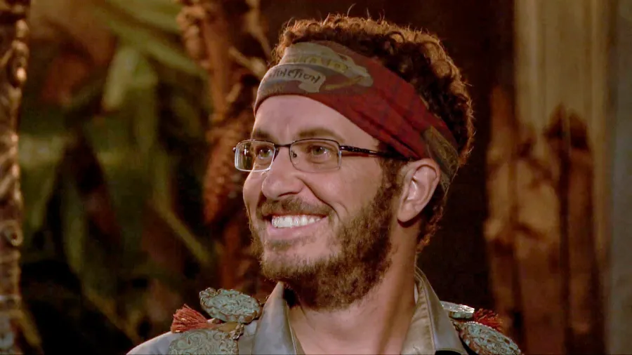 Rick Devans wearing the immunity necklace at Tribal Council.