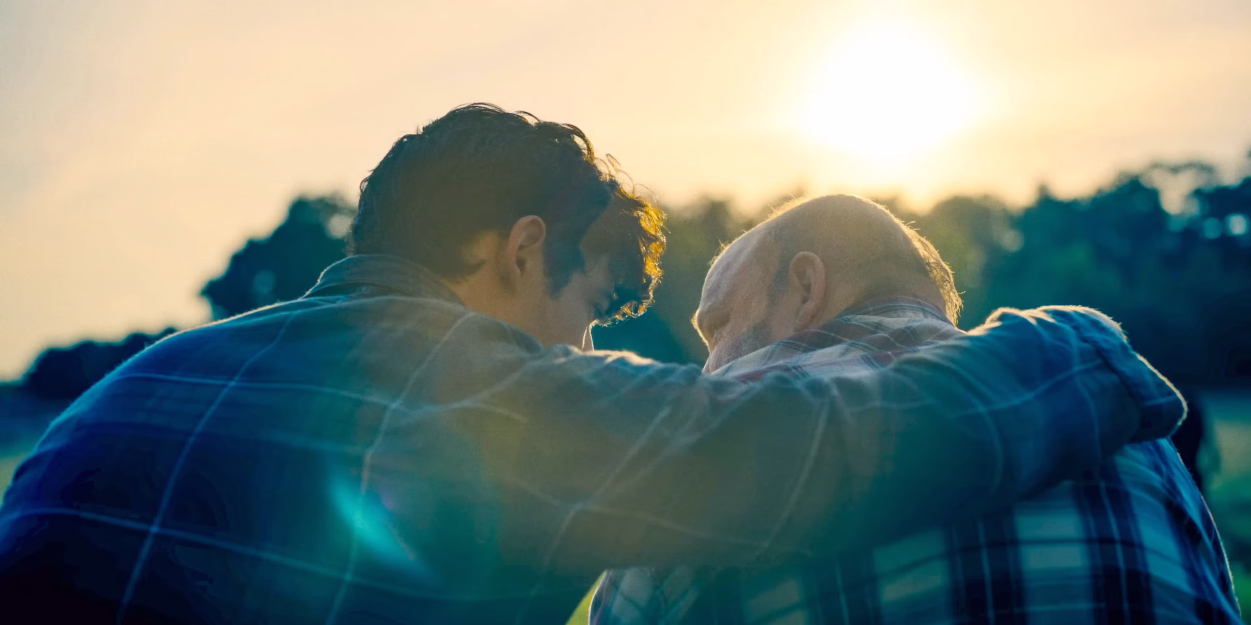 Clark hugs his adoptive father. Gunn, James. superman. DC studios, 2025.