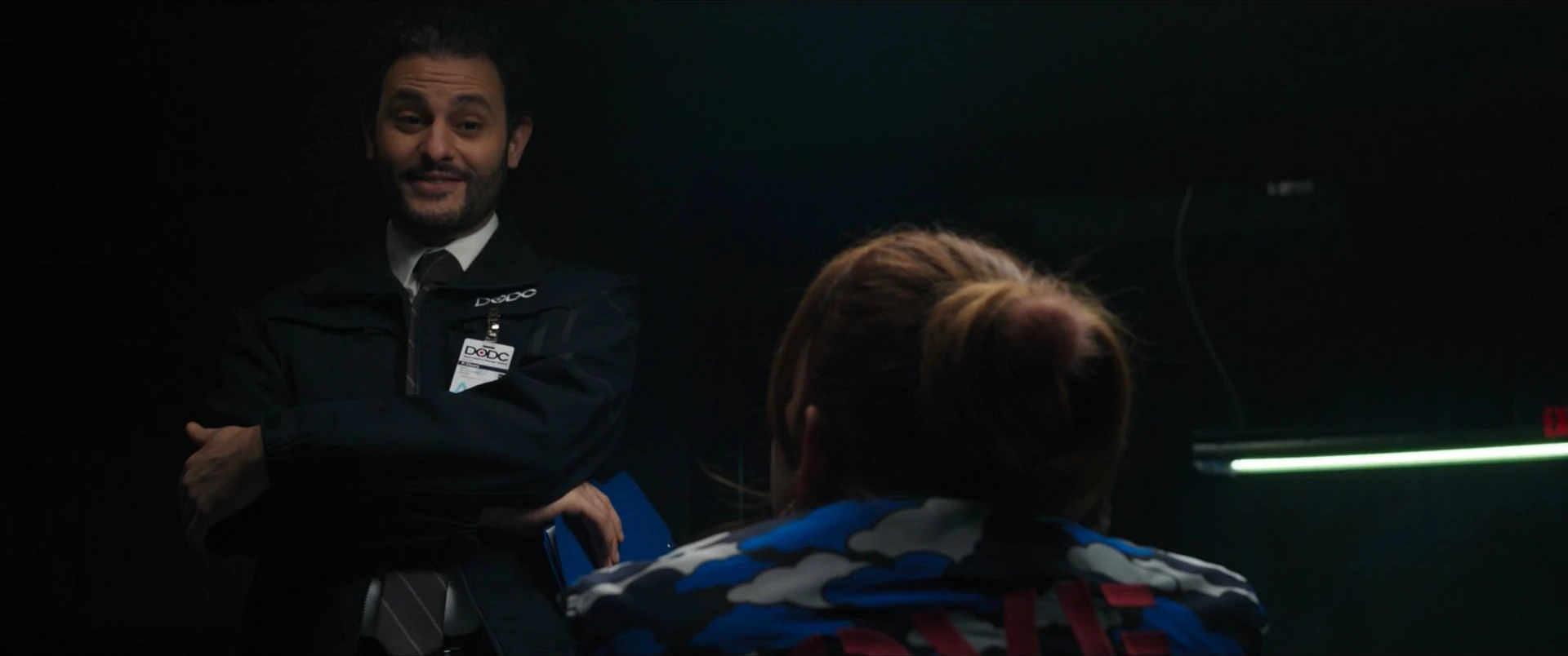 Agent Cleary interrogates Zoe Zimmer. Menon, Meera. 2022. "Crushed." Episode 2, Season 1 of Ms. Marvel. Marvel Studios.