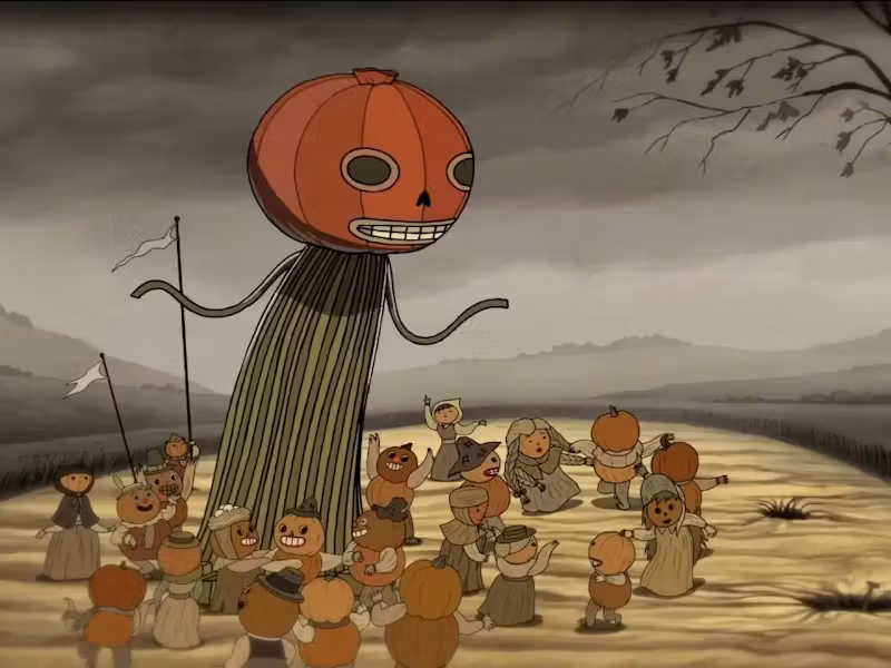 Enoch and the pumpkin villagers dancing during the Pottersfield harvest festival.