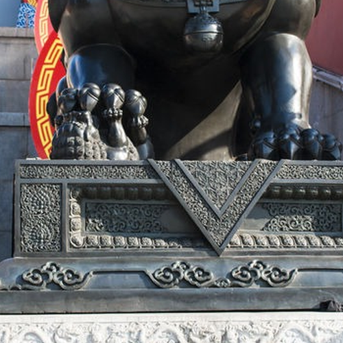 4.為什麼古門前的石獅左右不一樣?