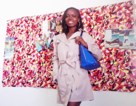 Damali in Isaac Mizrahi Coat and Bag