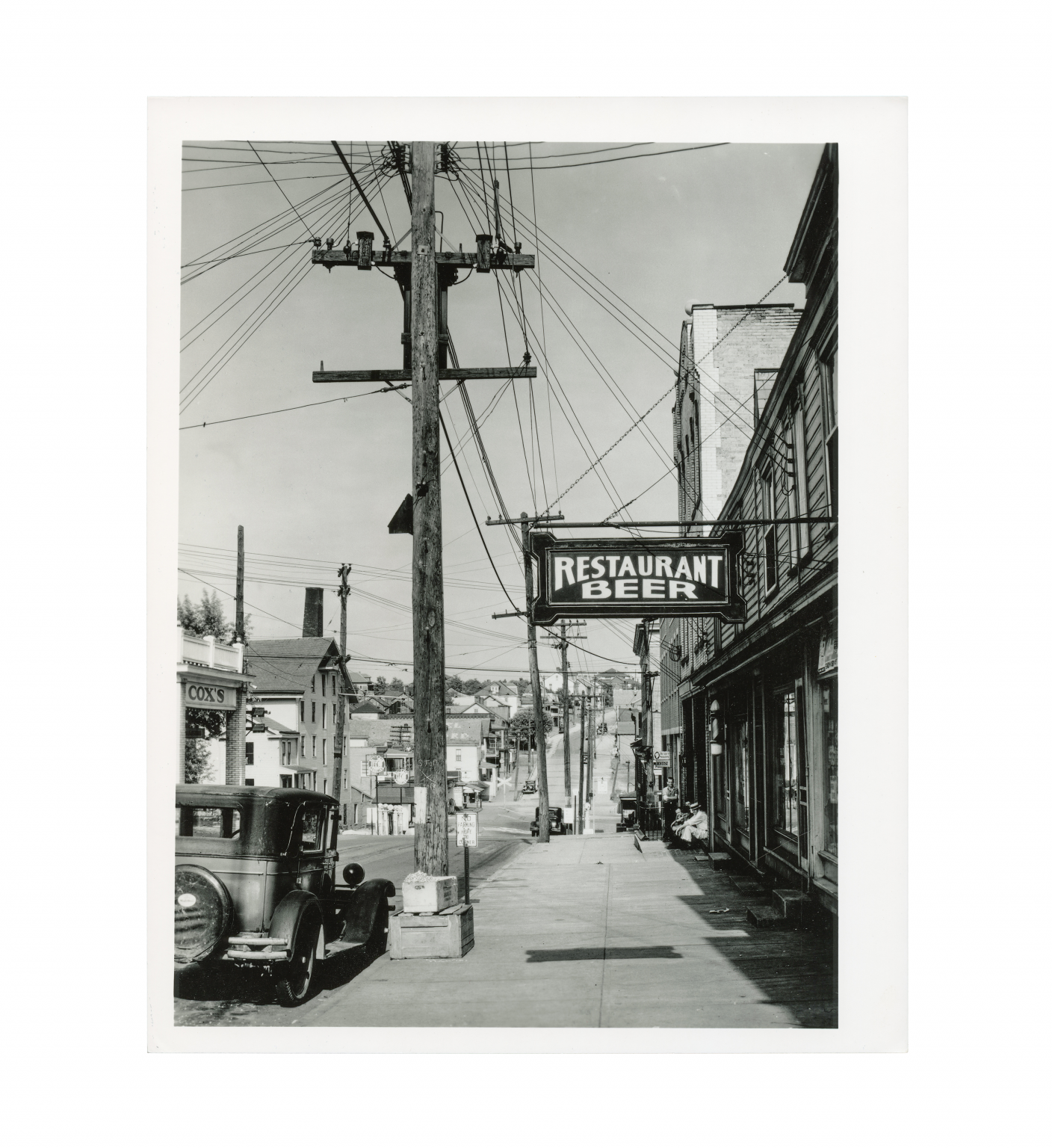 Sidewalk Scene with Pedestrians and Restaurant Sign, Main Street, Mt. Pleasant, Pennsylvania