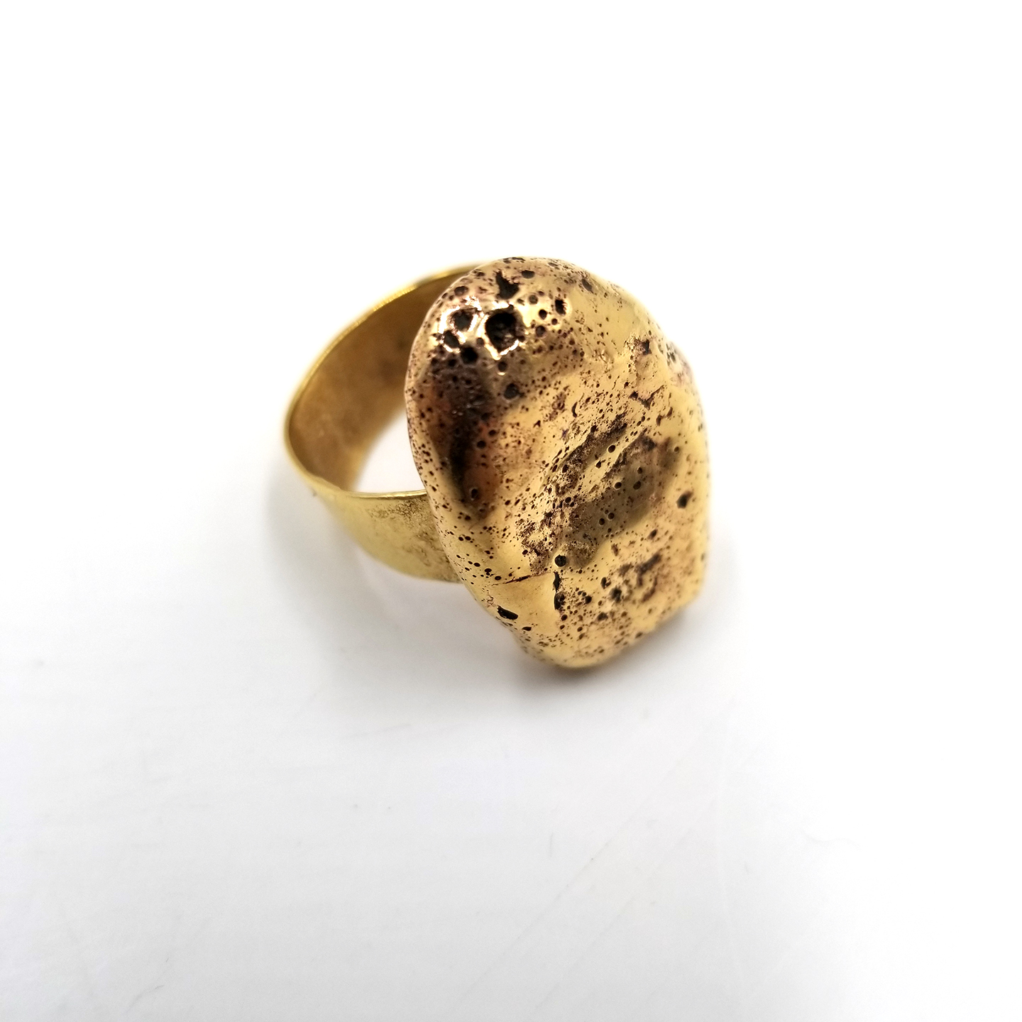 Short brass nugget ring with holes