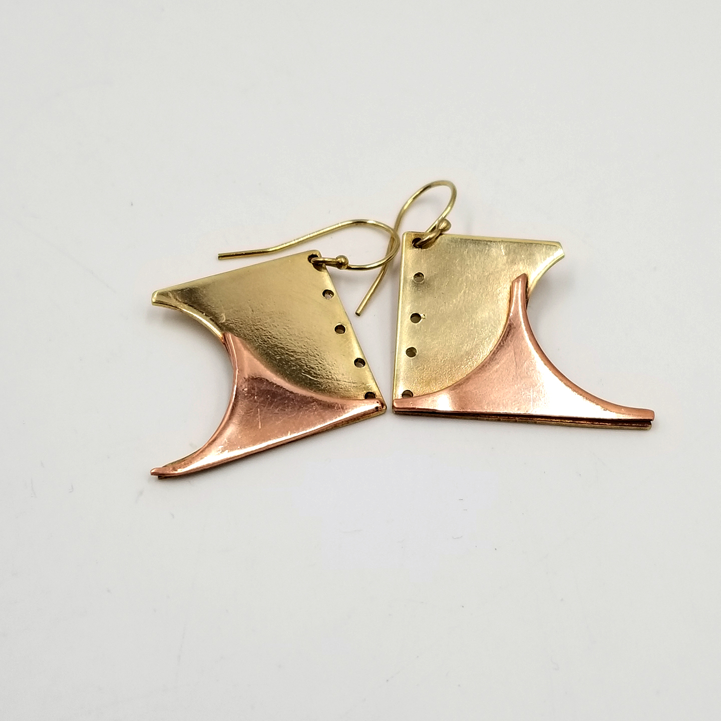 Brass and Copper earrings resembling cowboy boots
